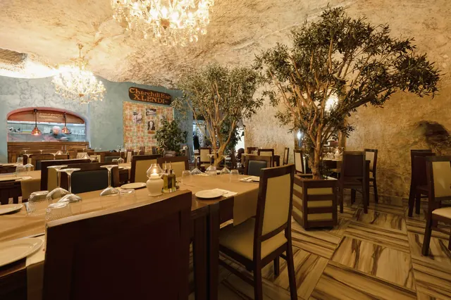 Churchill dining room beneath its stone ceiling