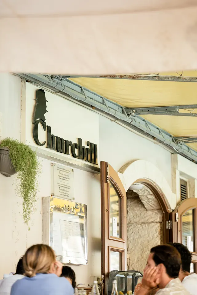 Entrance to Churchill Restaurant in Xlendi